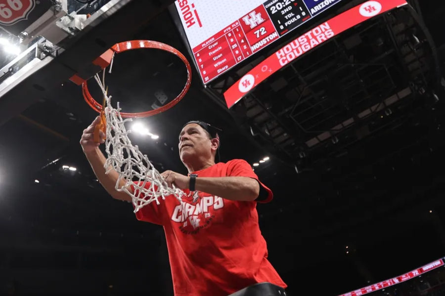 March 15, 2025; Kansas City, Mo, USA; Houston Cougar's head coach Kelvin Sampson cuts the net after defeating Arizona Wildcats in the Big 12 Conference Tournament Championship Game at the T-Mobile Center. Mandatory Credit: William Purnell-Imagn Images